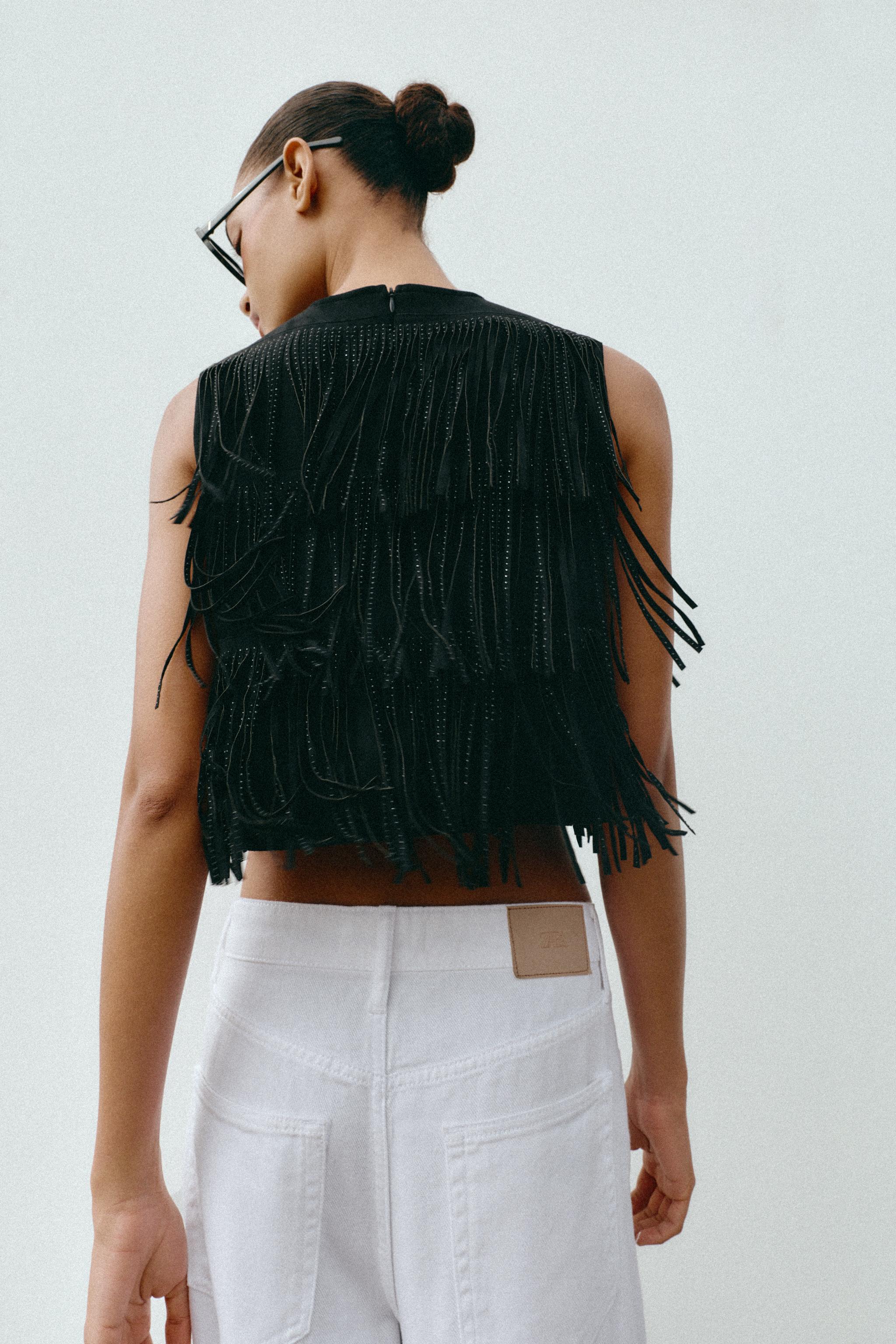 STUDDED FAUX SUEDE FRINGE TOP